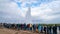 The Strokkur geyser in Iceland is erupting while tourists are looking