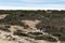 Strolling through an area of beach sand dunes