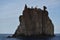 Strombolicchio, sea stack of volcanic origin, Aeolian Islands, Sicily, Italy, with lighthouse