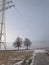 Stromleitungen im Nebel - Power lines in the fog