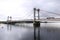 The Stromsund bridge in Stroms vattudal, an extensive water system in Swedish Jamtland in summer on a cloudy day