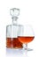 Strong alcoholic drink cognac in sniffer glass and crystal decanter