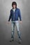 Strong assertive urban fantasy male wearing faded blue jeans