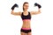 Strong athletic girl in boxing gloves strained muscles in her arms and smiling