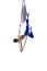 Strong, athletic, young man, professional aerial gymnast training with aerial silk ribbons against white studio