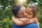 Strong bonds that can never break. an affectionate father embracing his daughter at the park.