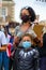 Strong female leader wears Black Lives Matter PPE face mask along with Superhero son at BLM protest in Richmond, North Yorkshire