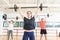 Strong Female Lifting Barbell In Health Club