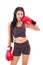 Strong fitness woman boxer or fighter punching her cheek pose