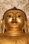 Strong golden meditating Buddha face with third eye Burma Myanma