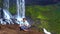 Strong guy sits in pranayama yoga pose on rock at waterfall