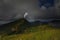 Strong lightning on mountaintop in the forest