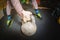 Strong male hand with grey kettlebell in gym fitness sports center. Sports concept