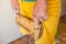 strong male hand of a rock climber holds a board