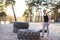 Strong man training workout lifting large tire outdoor DIY gym