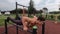 Strong muscular guy workout advanced push ups outdoor