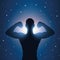 Strong muscular man silhouette at night on starry sky