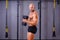 Strong ripped bald man pumping iron. Sports man working out with