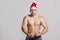Strong Santa posing with bodybuilding pose