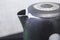 Strong scale on the spout of the kettle, home appliances, macro