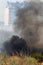 Strong smoke in steppe. Forest and steppe fires destroy fields and steppes during severe droughts. Fire, strong smoke. Blur focus