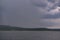 Strong summer storm. Water bubbles formed on the surface of the lake due to heavy rain