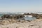 Strong waves, stones sea cliffs, Sea Point promenade Cape Town