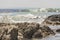 Strong waves, stones and sea cliffs, Sea Point promenade in Cape Town, South Africa