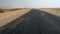 Strong wind blowing on the road to Sossusvlei in the wonderful Namib Naukluft National Park, travel destination in Namibia, Africa