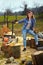 Strong woman woodcutter with her tools