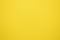 Strong yellow, lemon yellow background texture for banner or web.