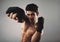 Strong young man practicing shadow boxing