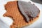 Stroopwafels, typical Dutch dessert with cinnamon and honey inside. covered with a thin layer of chocolate