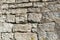 Structural masonry from natural stone of an old fortress wall.