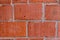 The structure of the brick wall. Brickwork close-up. Mason work