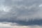 Structure of overcast sky as background. Clouds form texture. Approaching rain front