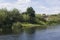 Stryzhen river in summer, with the geese