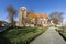 Strzelce Krajenskie, Lubuskie / Poland - November, 3, 2020: Old Catholic Church in the center of a small town. Brick Christian