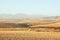 Stubble-cornfield in rolling landscape