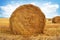 Stubble field and hay bales