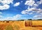 Stubble field and hay bales