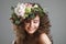 Stubio beauty portrait of cute young woman with flower crown