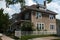 Stucco House with Picket Fence