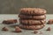 Stuck of chocolate brownie cookies  on gray concrete background