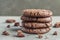 Stuck of chocolate brownie cookies  on gray concrete background