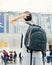 Student with backpack in airport