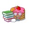 Student with book pancake with strawberry mascot cartoon
