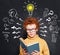 Student boy with book, idea lightbulb and question marks