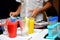 Student boy tinkering with test tubes. The child does experiments at home. Children`s home lab