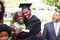 Student Celebrates Graduation With Parents